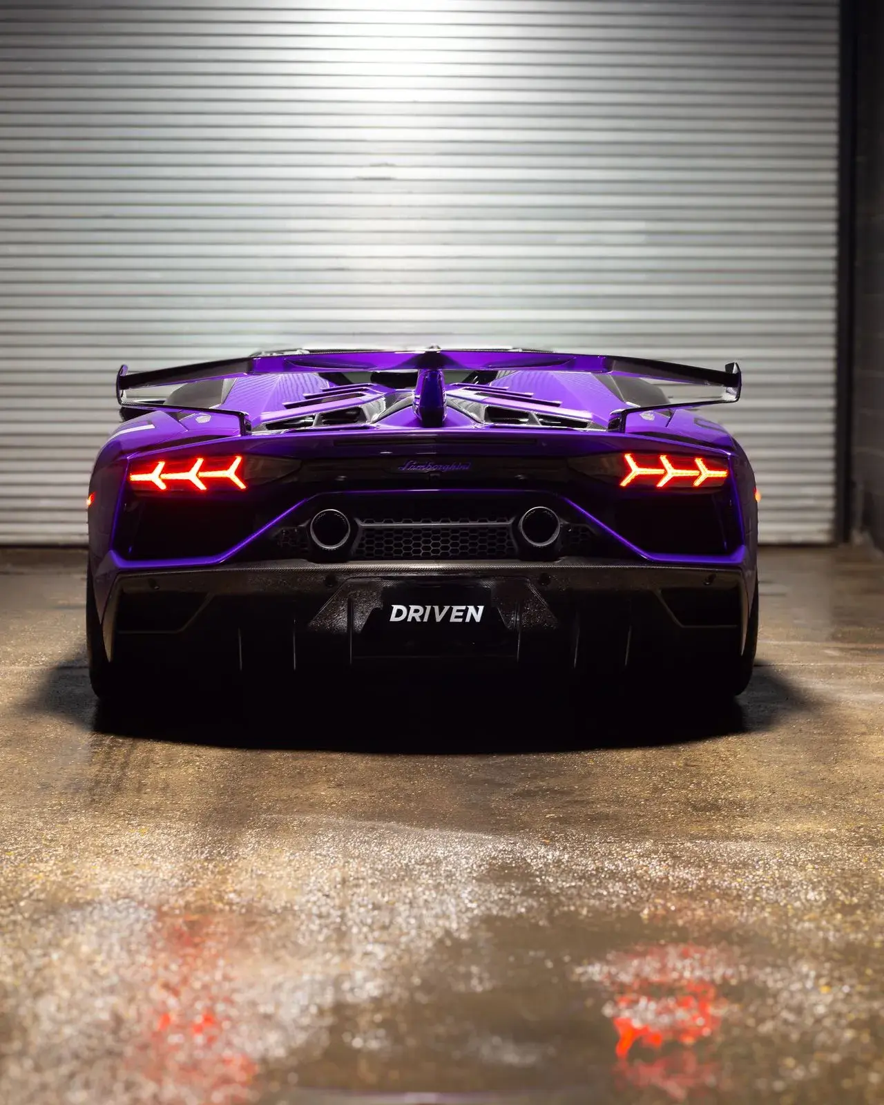 Purple Lamborghini Aventador ceramic coated rear view at Driven Auto Styling
