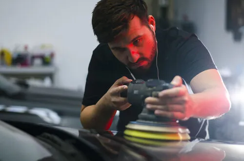 Restoration Detail - detailer performing multi-stage paint correction