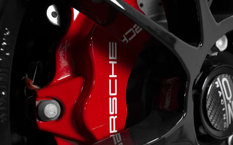 Porsche red powder coated brake caliper