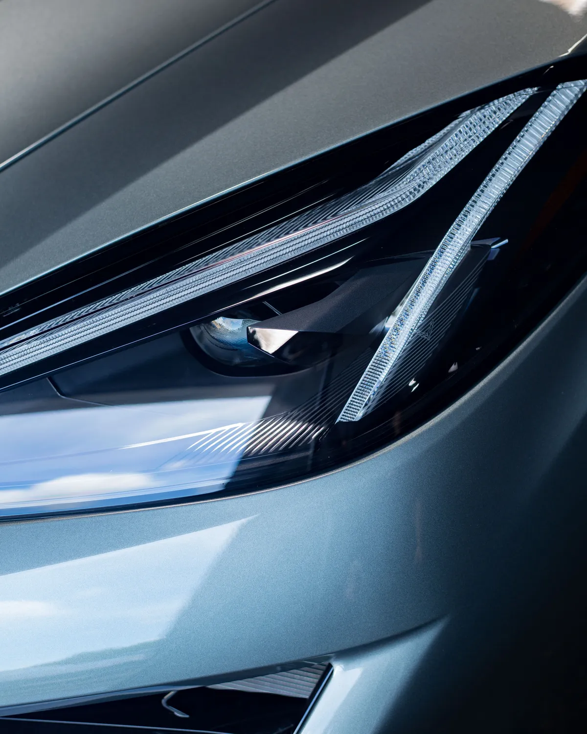 C8 Corvette headlight close-up showing PPF craftsmanship