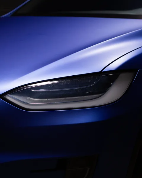 Blue matte Tesla Model X headlight detail