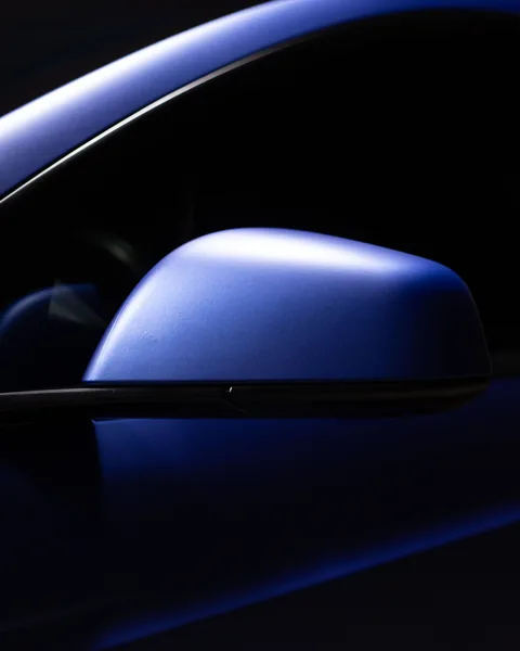 Matte blue Tesla Model X side mirror detail