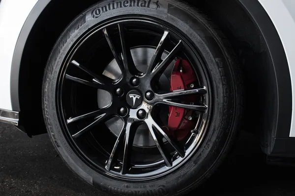 Tesla Model Y Performance wheel with red brake caliper