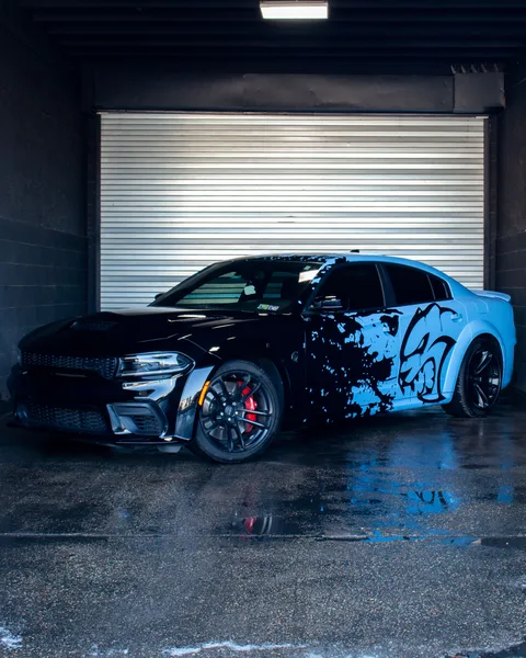 Custom accent wrap with Hellcat graphic on Dodge Charger at Driven Auto Styling